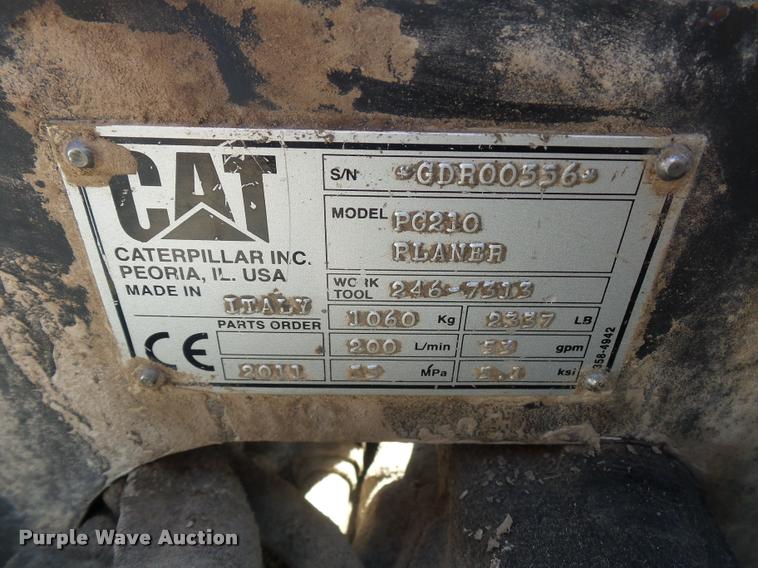 image for item L4603 2011 Caterpillar PC210 skid steer milling attachment