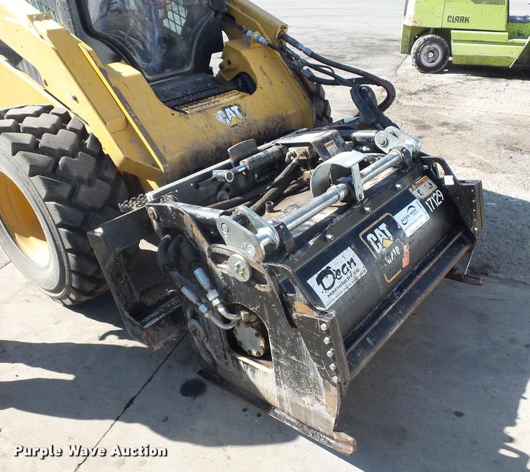 image for item L4604 2011 Caterpillar PC210 skid steer milling attachment