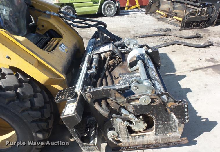 image for item L4604 2011 Caterpillar PC210 skid steer milling attachment