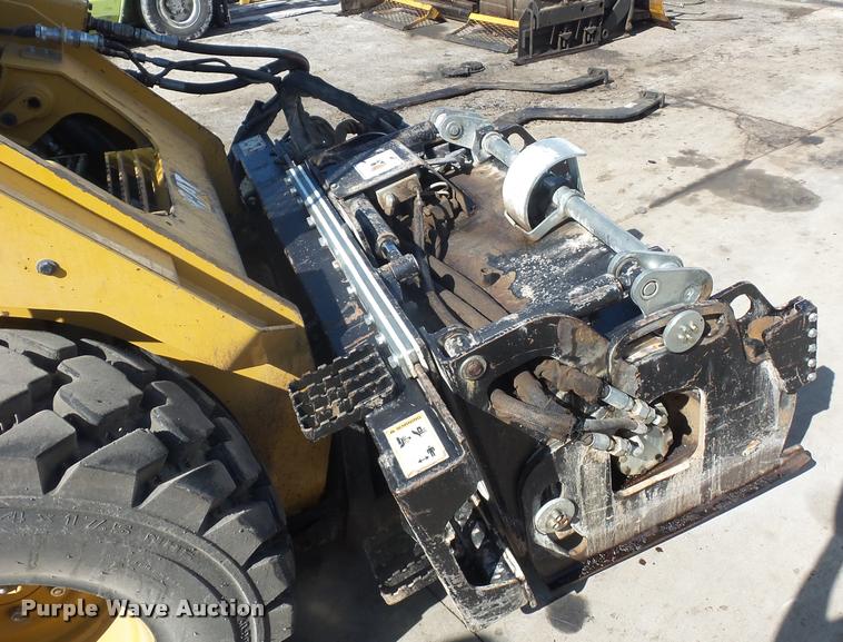 image for item L4604 2011 Caterpillar PC210 skid steer milling attachment