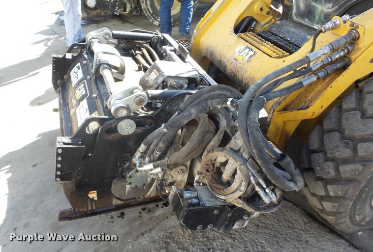 image for item L4604 2011 Caterpillar PC210 skid steer milling attachment