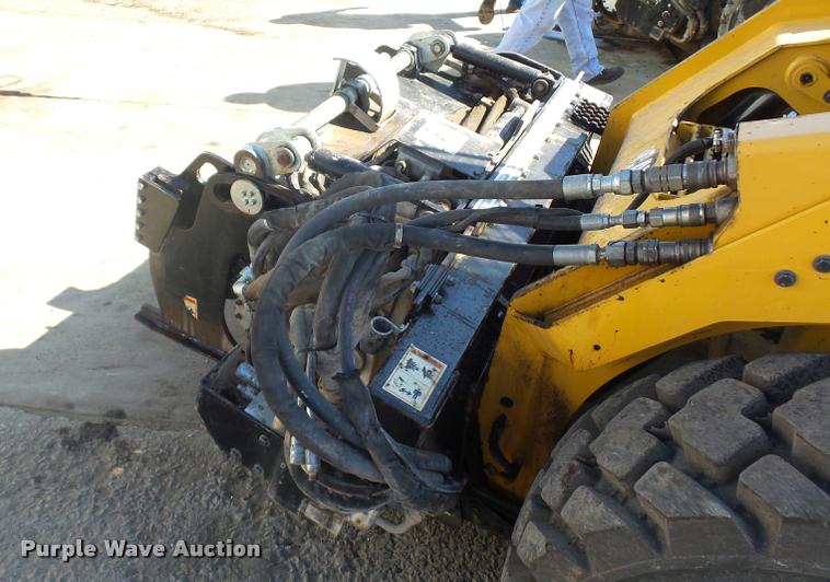 image for item L4604 2011 Caterpillar PC210 skid steer milling attachment