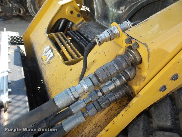 image for item L4604 2011 Caterpillar PC210 skid steer milling attachment