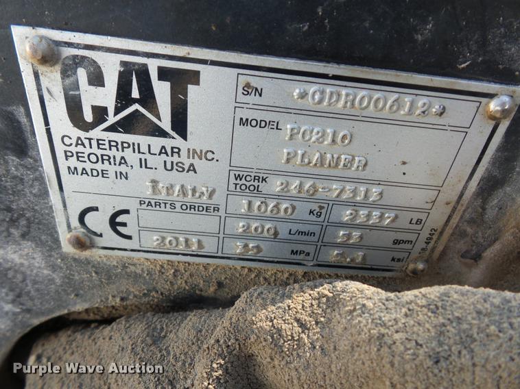 image for item L4604 2011 Caterpillar PC210 skid steer milling attachment