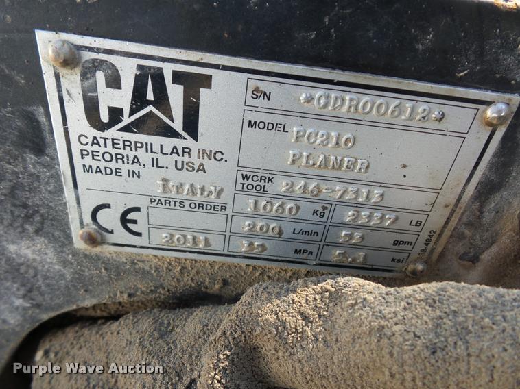 image for item L4604 2011 Caterpillar PC210 skid steer milling attachment