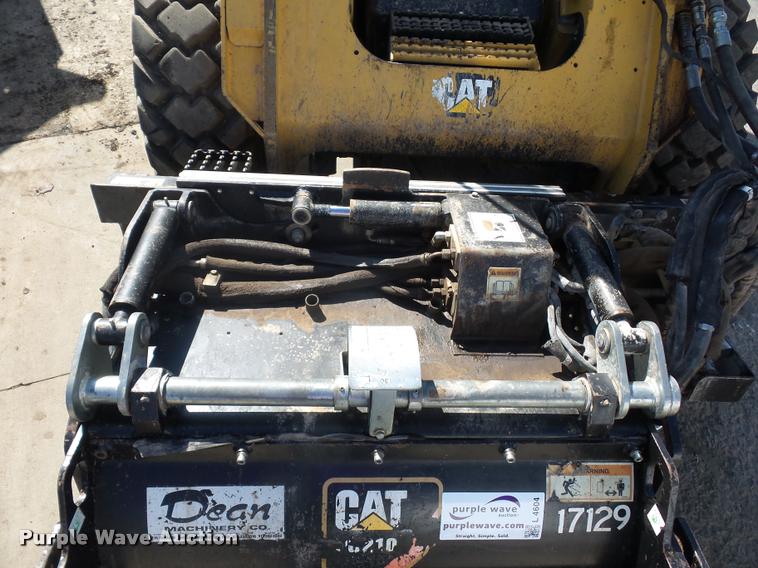 image for item L4604 2011 Caterpillar PC210 skid steer milling attachment