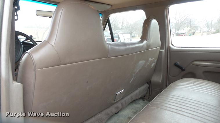 image for item DB0704 1997 Ford F250 Super Duty XL Crew Cab utility bed pickup truck