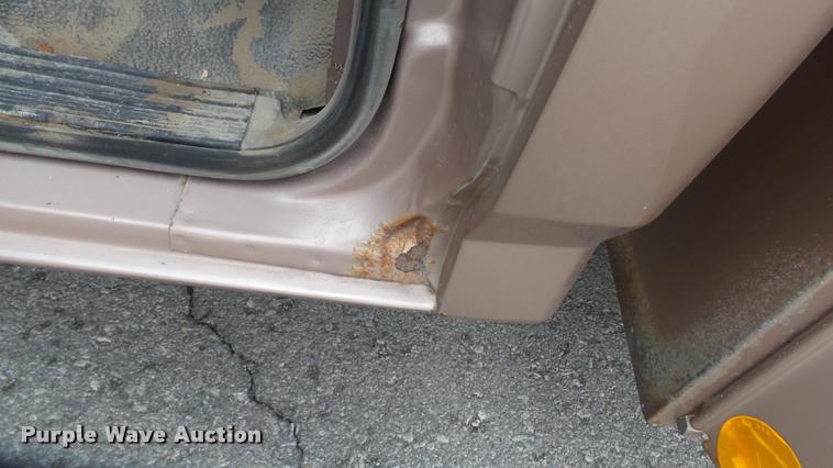 image for item DB0704 1997 Ford F250 Super Duty XL Crew Cab utility bed pickup truck