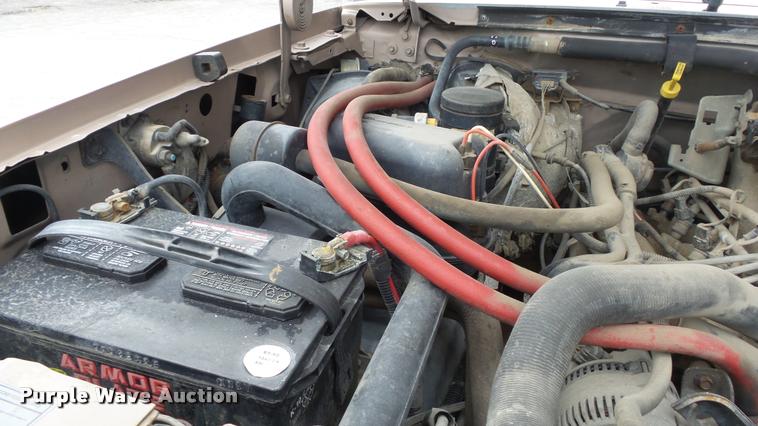 image for item DB0704 1997 Ford F250 Super Duty XL Crew Cab utility bed pickup truck