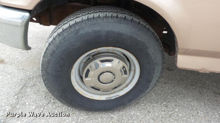 image for item DB0704 1997 Ford F250 Super Duty XL Crew Cab utility bed pickup truck