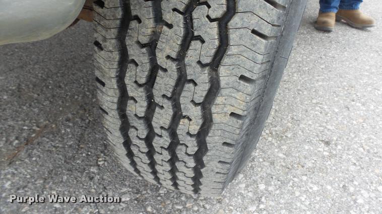 image for item DB0704 1997 Ford F250 Super Duty XL Crew Cab utility bed pickup truck