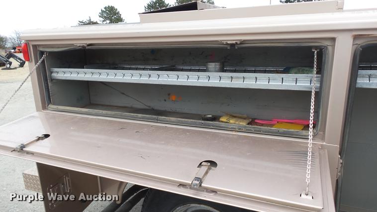 image for item DB0704 1997 Ford F250 Super Duty XL Crew Cab utility bed pickup truck