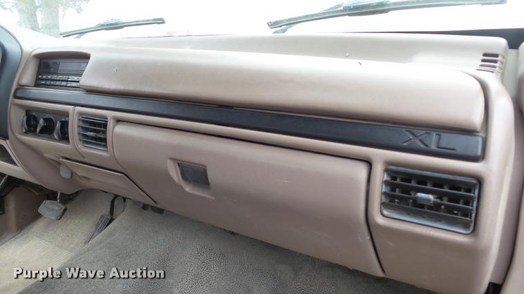 image for item DB0704 1997 Ford F250 Super Duty XL Crew Cab utility bed pickup truck