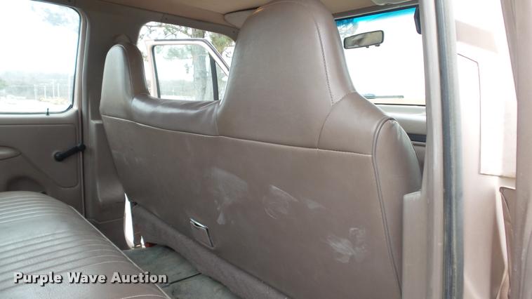 image for item DB0704 1997 Ford F250 Super Duty XL Crew Cab utility bed pickup truck