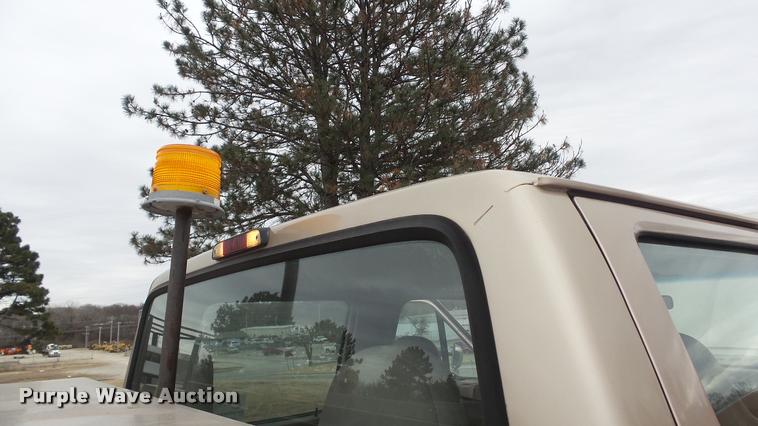 image for item DB0704 1997 Ford F250 Super Duty XL Crew Cab utility bed pickup truck