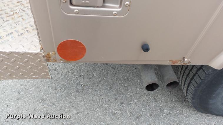 image for item DB0704 1997 Ford F250 Super Duty XL Crew Cab utility bed pickup truck