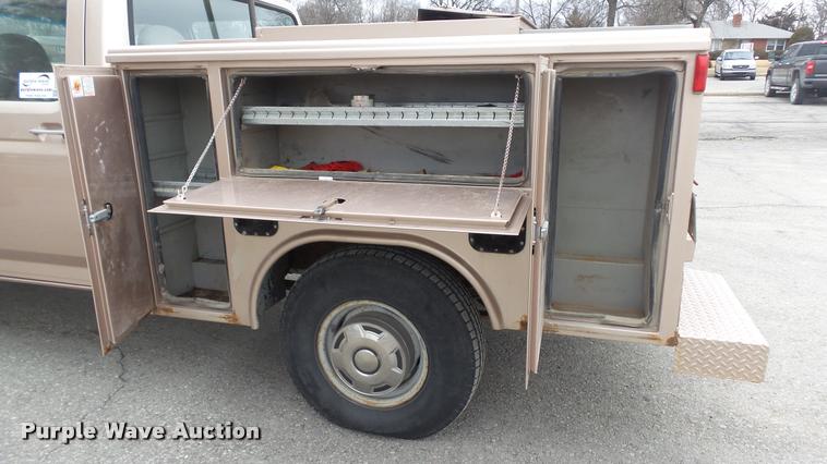 image for item DB0704 1997 Ford F250 Super Duty XL Crew Cab utility bed pickup truck