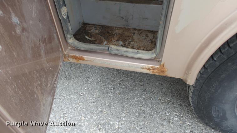 image for item DB0704 1997 Ford F250 Super Duty XL Crew Cab utility bed pickup truck