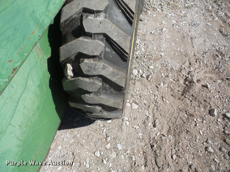 image for item DB0510 John Deere 70 skid steer