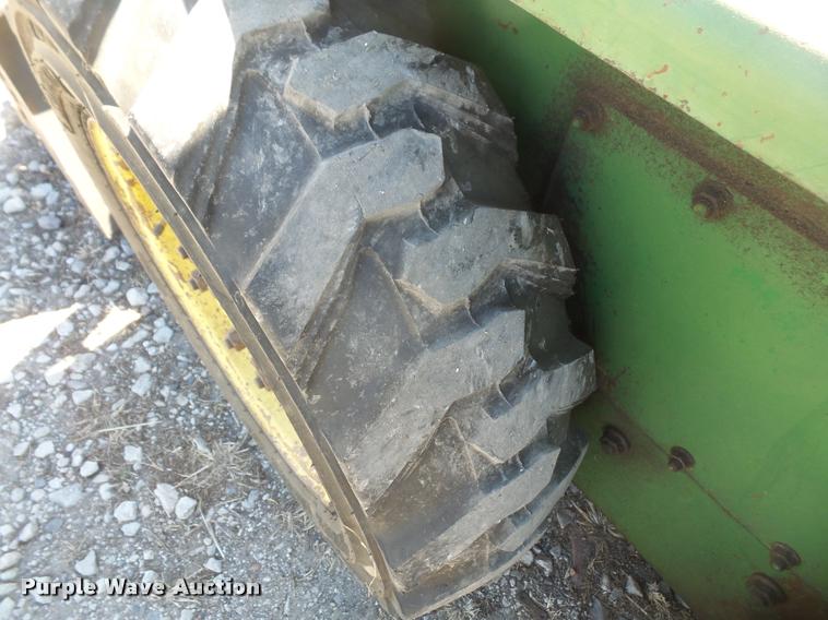 image for item DB0510 John Deere 70 skid steer
