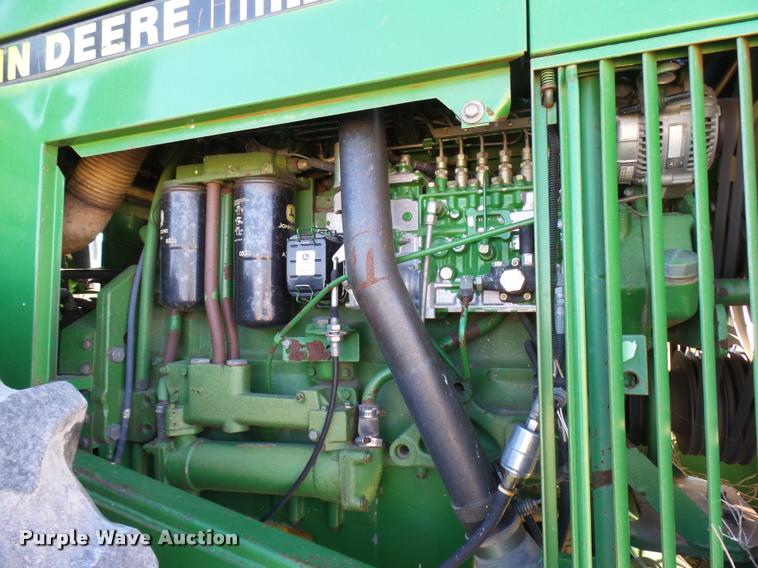 image for item DB2410 1991 John Deere 8760 4WD tractor