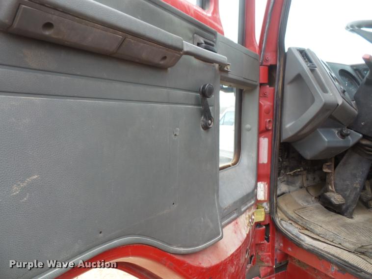 image for item DB2911 1990 Ford Cargo 8000 truck with New Holland 1060 bale stacker retriever