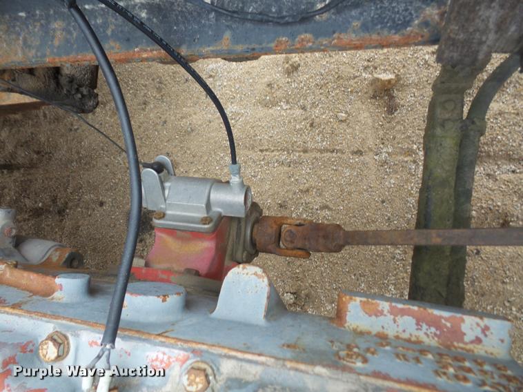 image for item DB2911 1990 Ford Cargo 8000 truck with New Holland 1060 bale stacker retriever