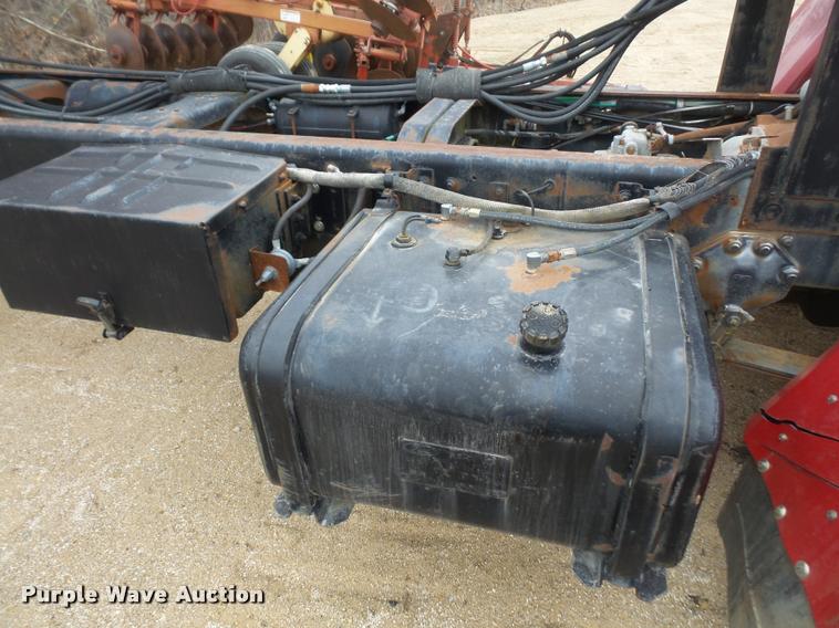 image for item DB2911 1990 Ford Cargo 8000 truck with New Holland 1060 bale stacker retriever