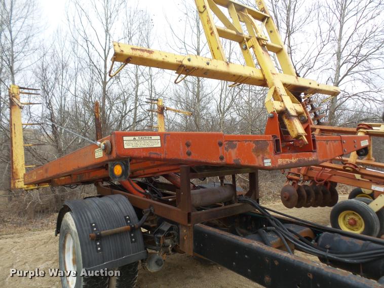 image for item DB2911 1990 Ford Cargo 8000 truck with New Holland 1060 bale stacker retriever