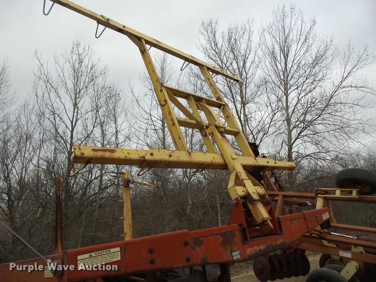 image for item DB2911 1990 Ford Cargo 8000 truck with New Holland 1060 bale stacker retriever