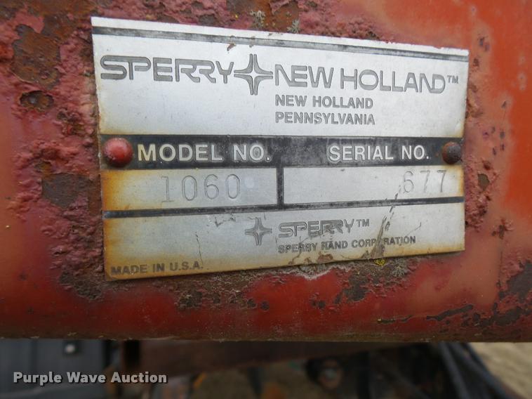 image for item DB2911 1990 Ford Cargo 8000 truck with New Holland 1060 bale stacker retriever