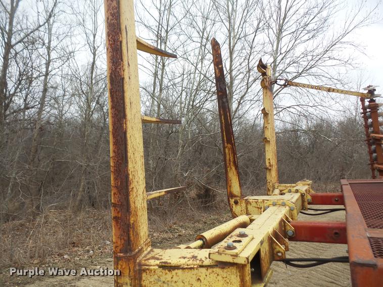 image for item DB2911 1990 Ford Cargo 8000 truck with New Holland 1060 bale stacker retriever