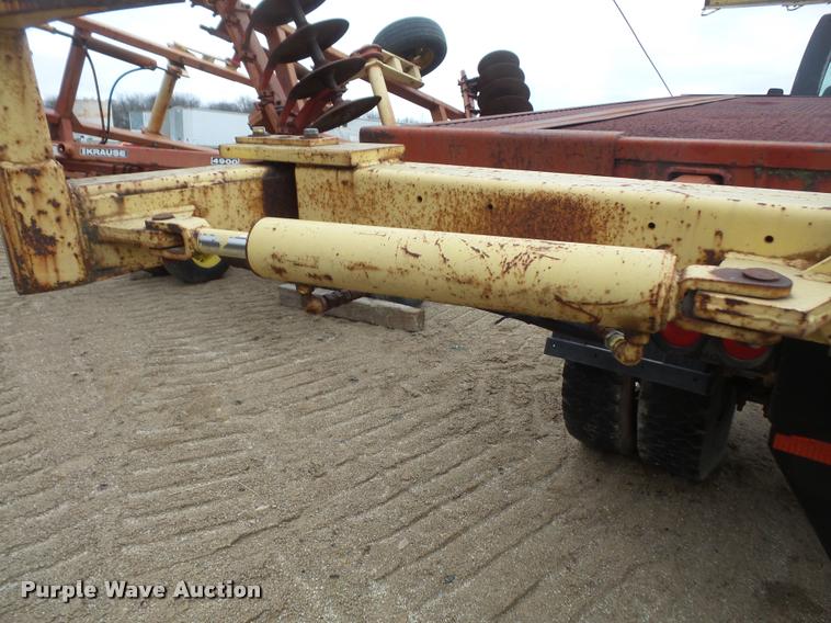 image for item DB2911 1990 Ford Cargo 8000 truck with New Holland 1060 bale stacker retriever