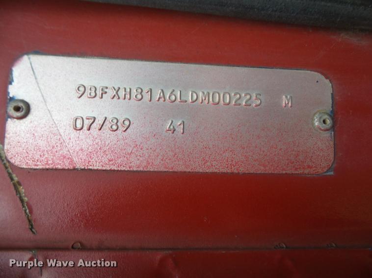 image for item DB2911 1990 Ford Cargo 8000 truck with New Holland 1060 bale stacker retriever