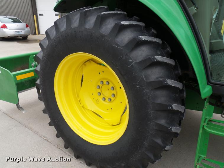 image for item L4633 2004 John Deere 6415 MFWD tractor