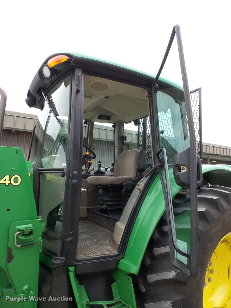 image for item L4633 2004 John Deere 6415 MFWD tractor