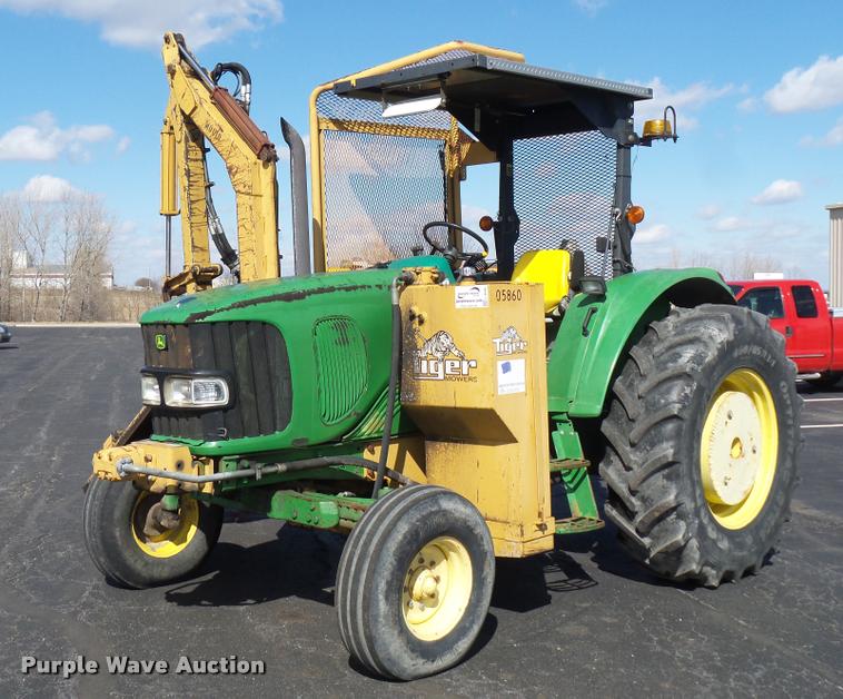 image for item L4646 2002 John Deere 6420 tractor