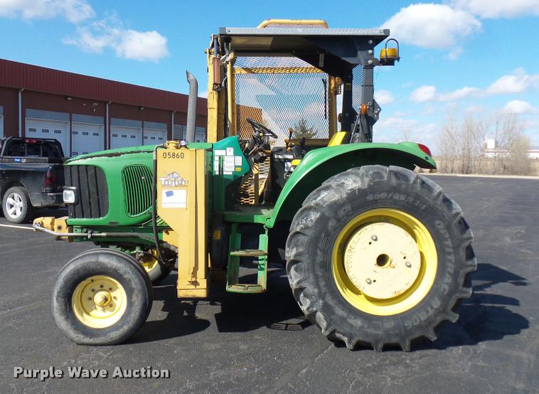 image for item L4646 2002 John Deere 6420 tractor
