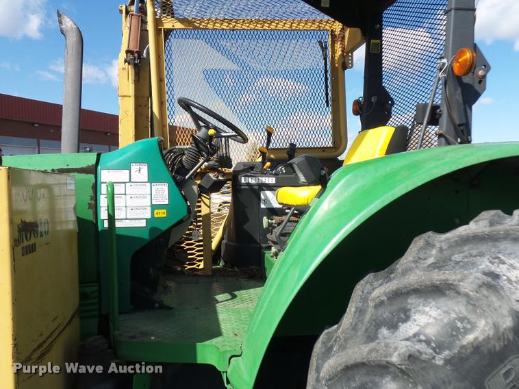 image for item L4646 2002 John Deere 6420 tractor