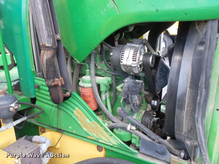 image for item L4646 2002 John Deere 6420 tractor