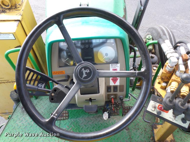 image for item L4646 2002 John Deere 6420 tractor