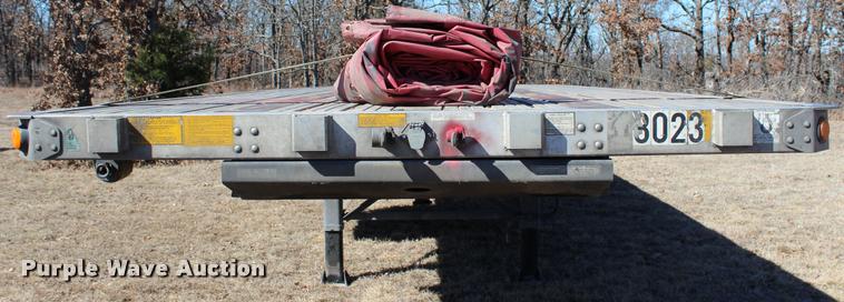 image for item L3018 2006 Utility FS2CHA flatbed trailer