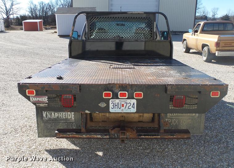 image for item DA2566 2004 Ford F350 Super Duty XLT flatbed pickup truck