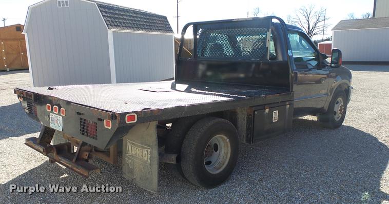 image for item DA2566 2004 Ford F350 Super Duty XLT flatbed pickup truck
