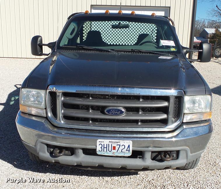 image for item DA2566 2004 Ford F350 Super Duty XLT flatbed pickup truck
