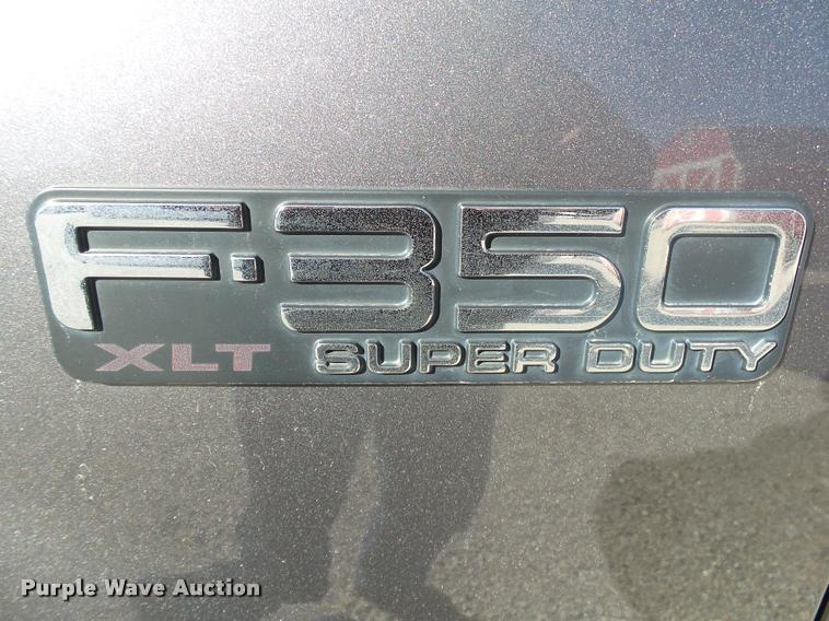 image for item DA2566 2004 Ford F350 Super Duty XLT flatbed pickup truck