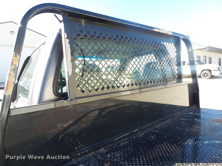image for item DA2566 2004 Ford F350 Super Duty XLT flatbed pickup truck