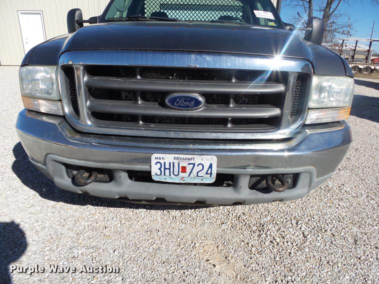 image for item DA2566 2004 Ford F350 Super Duty XLT flatbed pickup truck