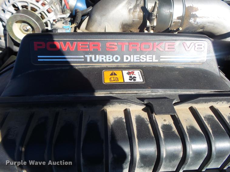 image for item DA2566 2004 Ford F350 Super Duty XLT flatbed pickup truck