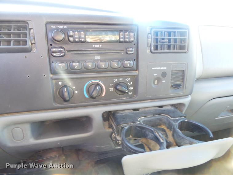 image for item DA2566 2004 Ford F350 Super Duty XLT flatbed pickup truck